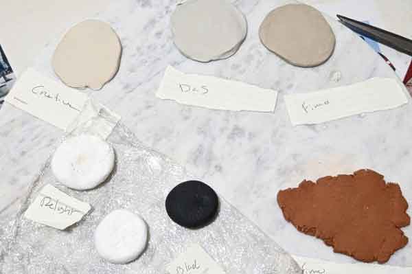 taking small amount of clay at a time